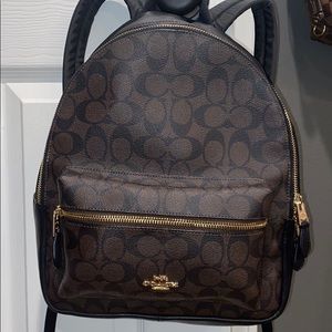 Brown and black coach backpack